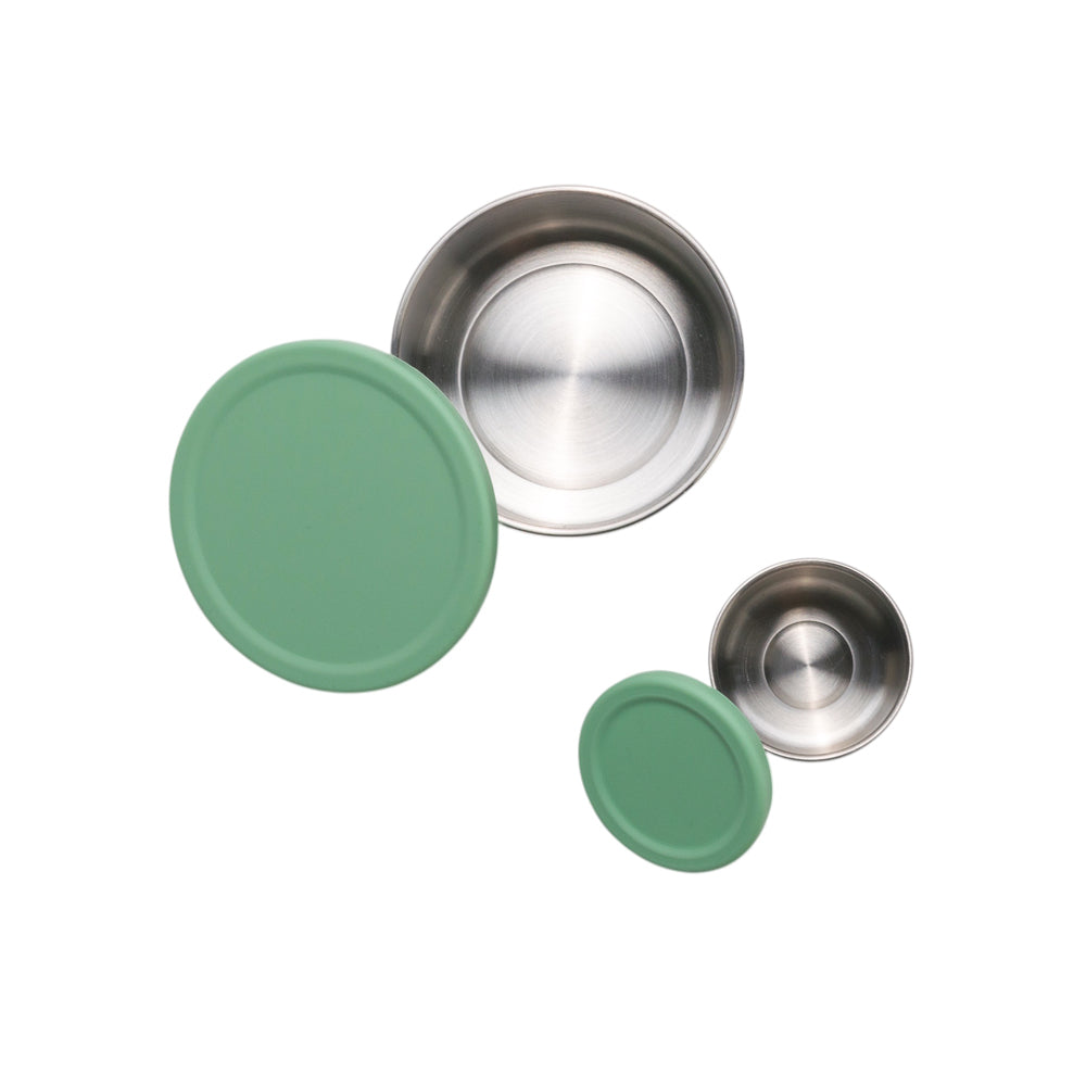 Stainless Steel dipper set with sage green silicone lids on a white background
