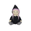 A cute witch doll plush toy with a black pointed hat decorated with white stars, a black dress, and black-and-white striped socks, featuring long pinkish-purple hair.