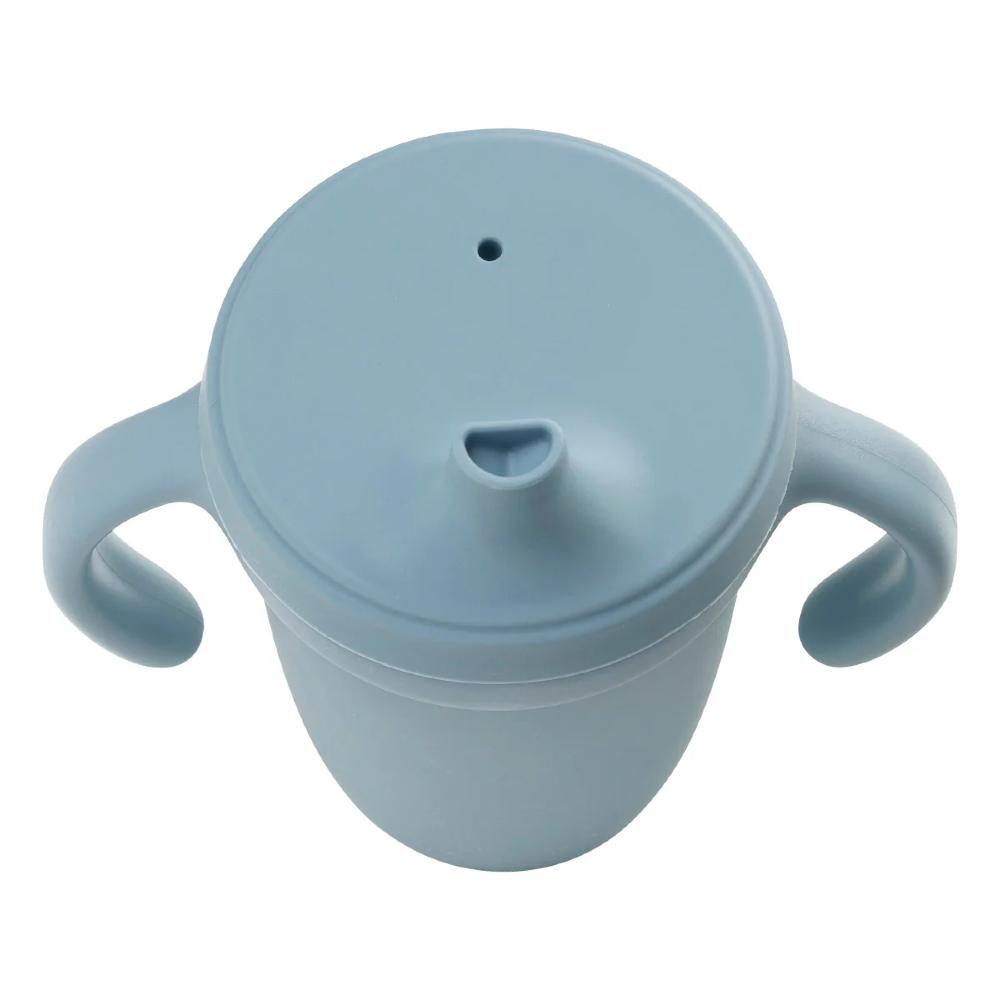 Light blue sippy cup with handles on a white background