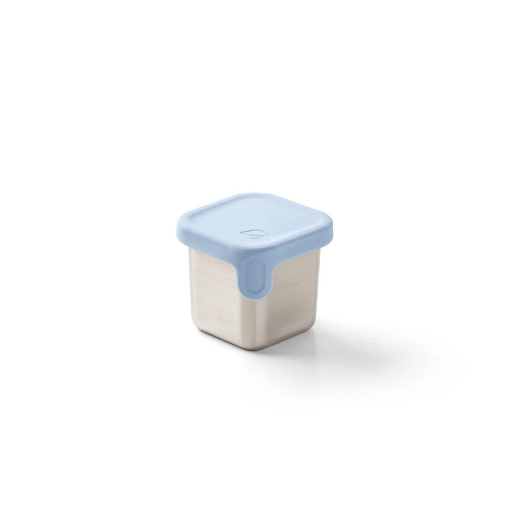 Small storage container with a blue lid on a white background