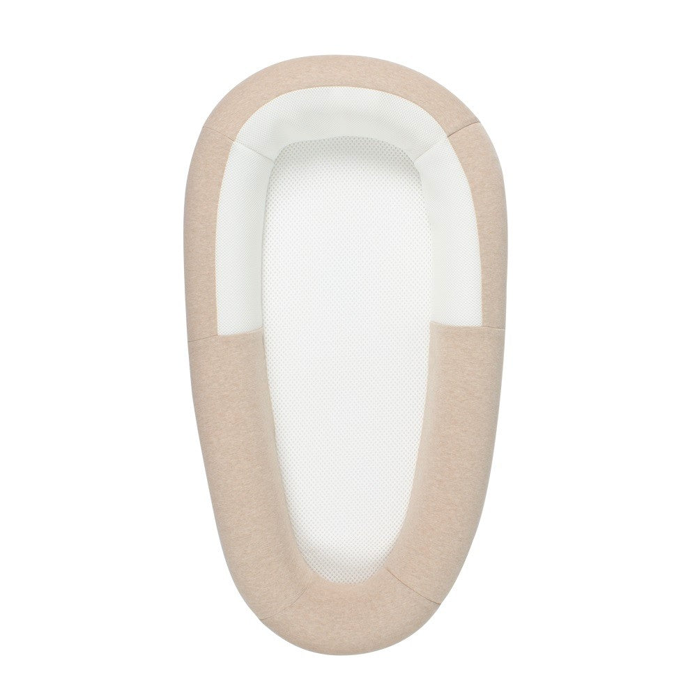 Beige and white breathabnle mesh baby bed on a white background