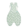 Green quilted winter swaddle bag with white leaf pattern and green fabric on a white background