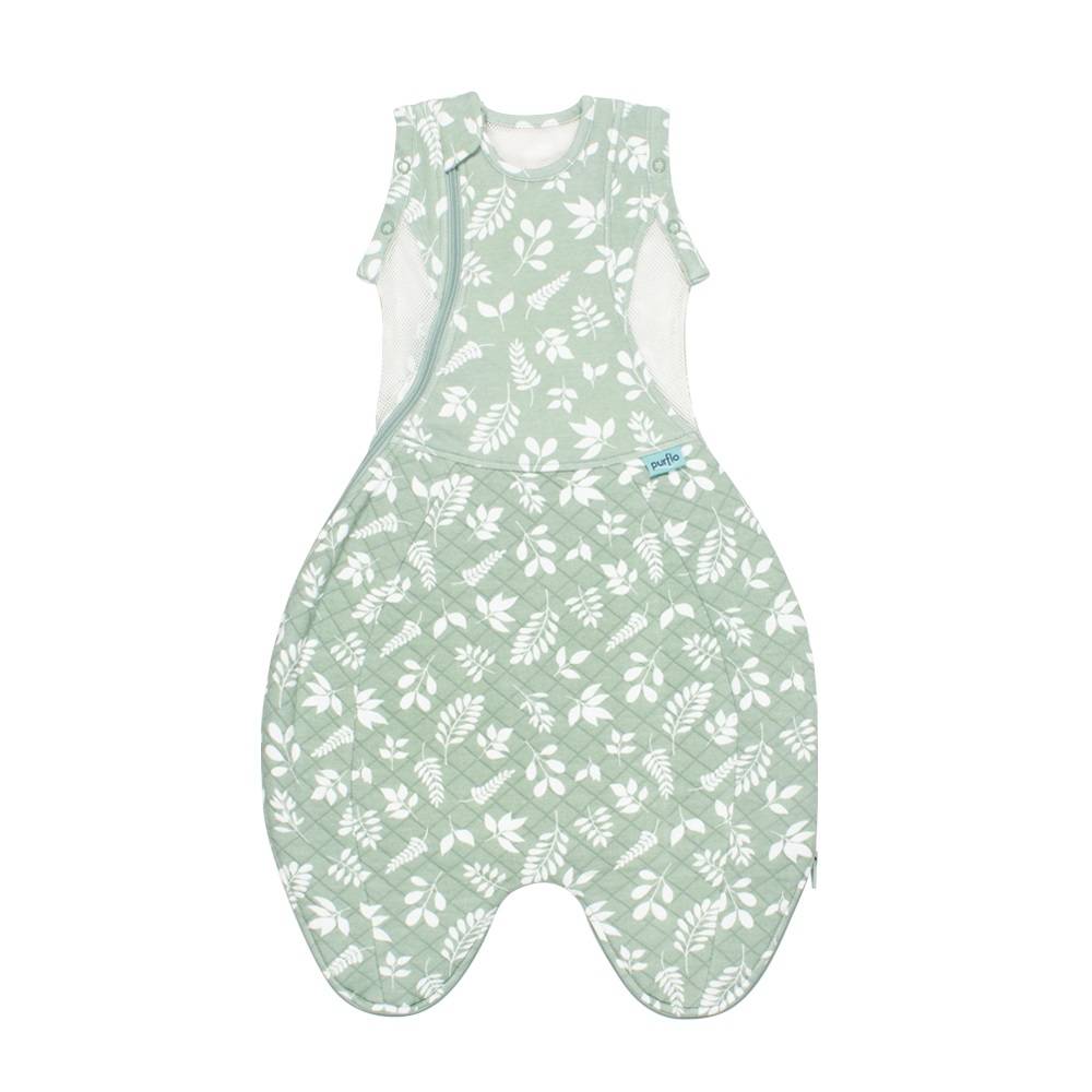 Green quilted winter swaddle bag with white leaf pattern and green fabric on a white background