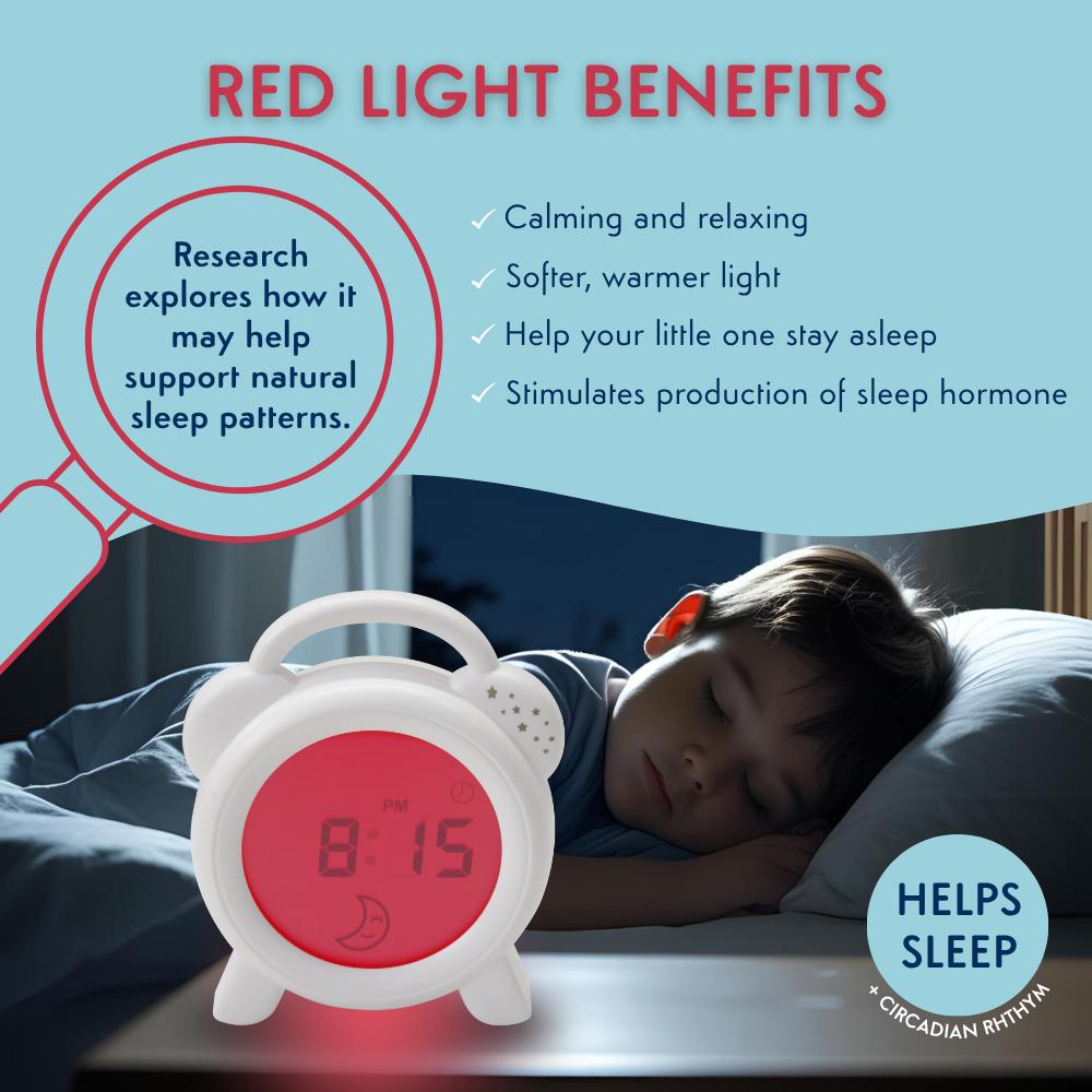 Red light clock on a nightstand with a child sleeping, highlighting red light benefits.