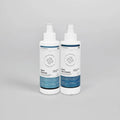 Two white spray bottles of Fabric Spot Cleaner and Fabric Protector, standing side-by-side on a light gray background.