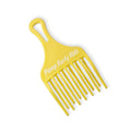 Yellow Pump Haircare comb against white background.