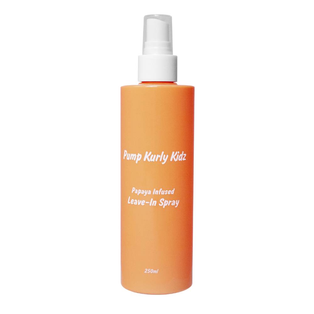Orange Pump Haircare bottle against white background.