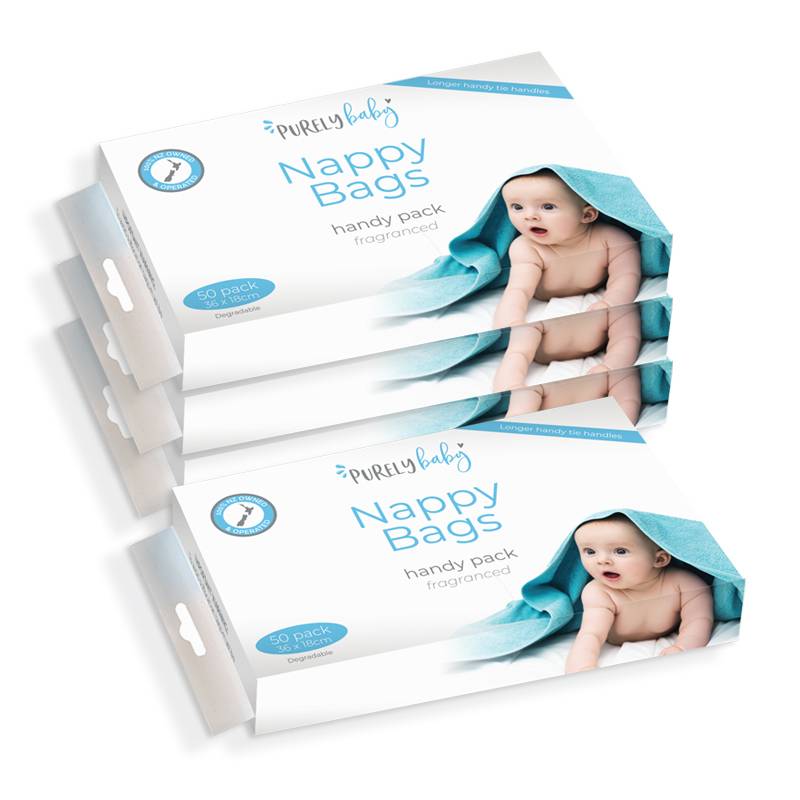 White Purely Baby nappy bag packs against white background.