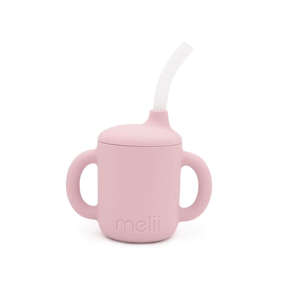 Pink Melii sippy cup with a straw on a white background