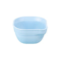 A Re-Play Dip 'n' Pour Bowl - Ice Blue on a white background