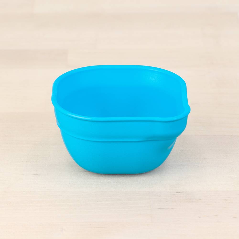 A Re-Play Dip 'n' Pour Bowl - Sky Blue on a white background