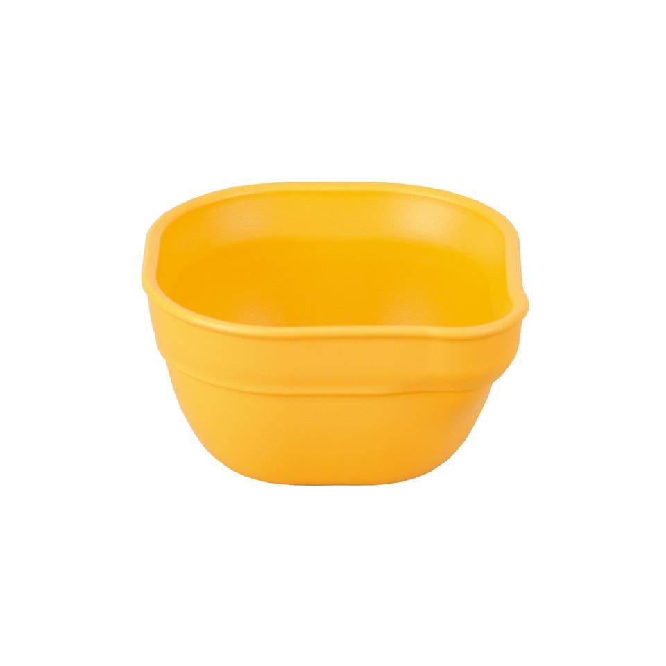 A Re-Play Dip 'n' Pour Bowl - Sunny Yellow on a white background