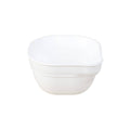 A Re-Play Dip 'n' Pour Bowl - White on a white background