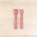A Re-Play Fork and Spoon - Desert on a white background
