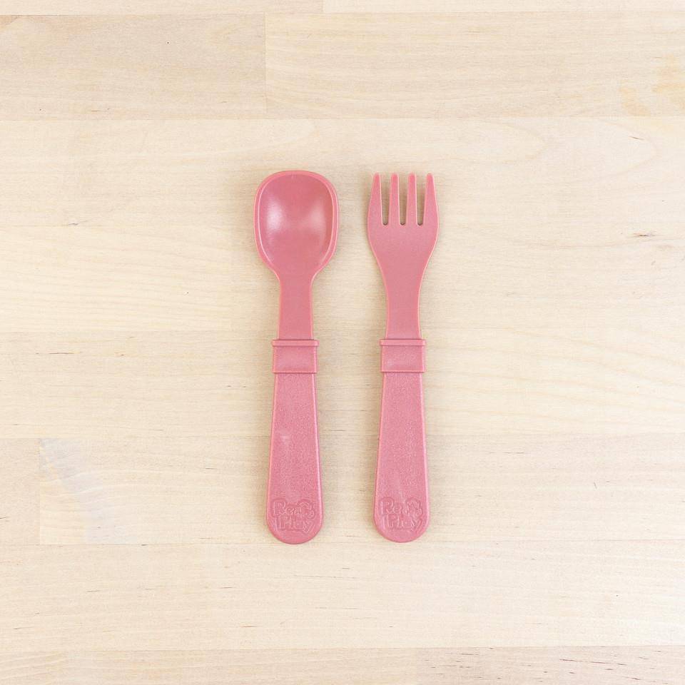 A Re-Play Fork and Spoon - Desert on a white background