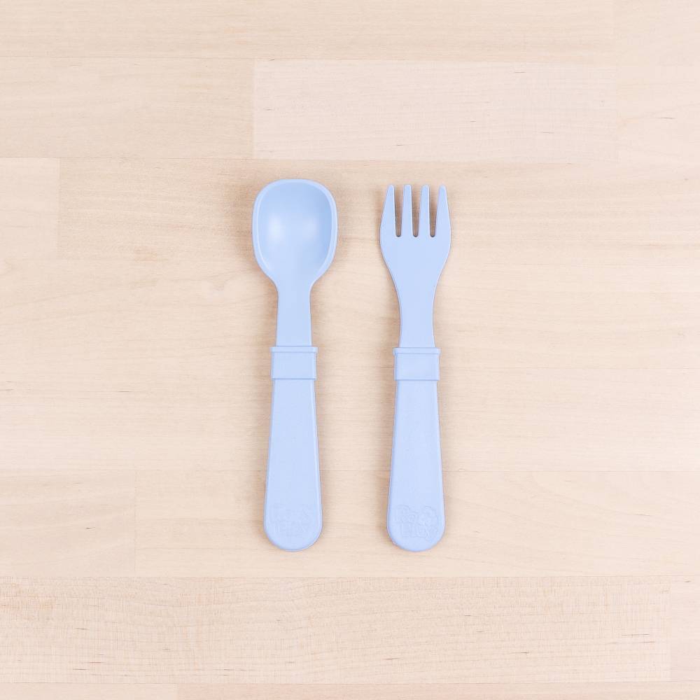 A Re-Play Fork and Spoon - Ice Blue on a white background