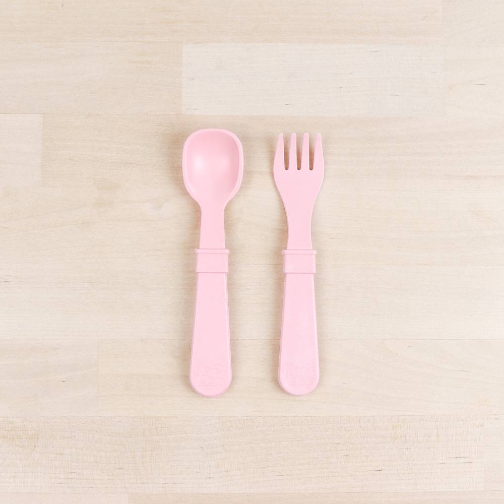 A Re-Play Fork and Spoon - Ice Pink on a white background