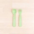 A Re-Play Fork and Spoon - Leaf on a white background