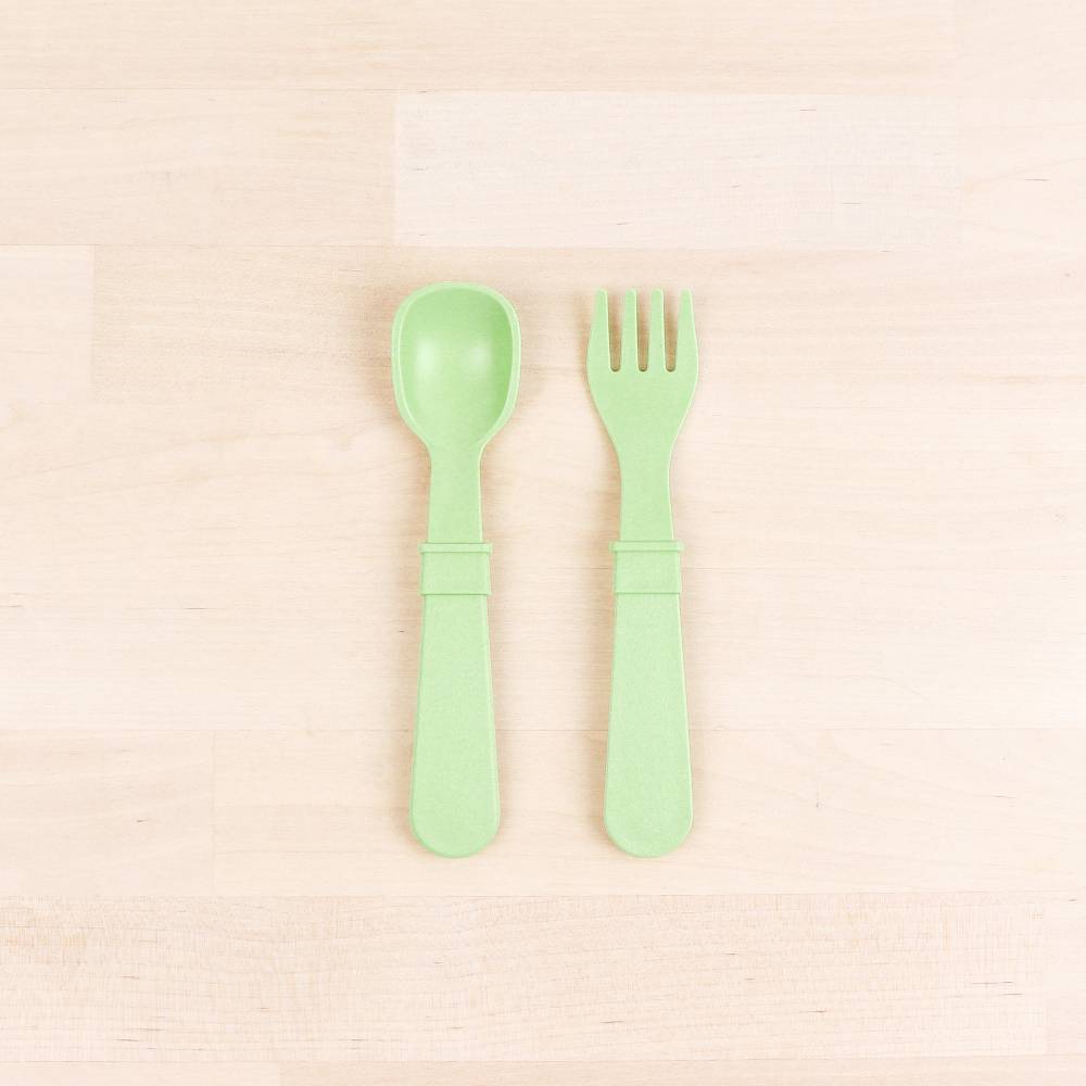 A Re-Play Fork and Spoon - Leaf on a white background