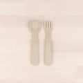 A Re-Play Fork and Spoon - Sand on a white background
