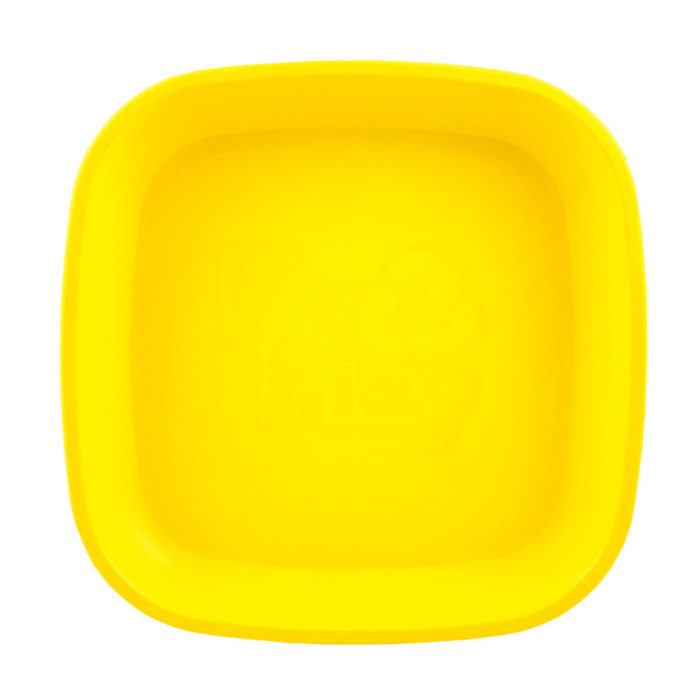 A Large Re-Play Flat Plate - Yellow on a white background