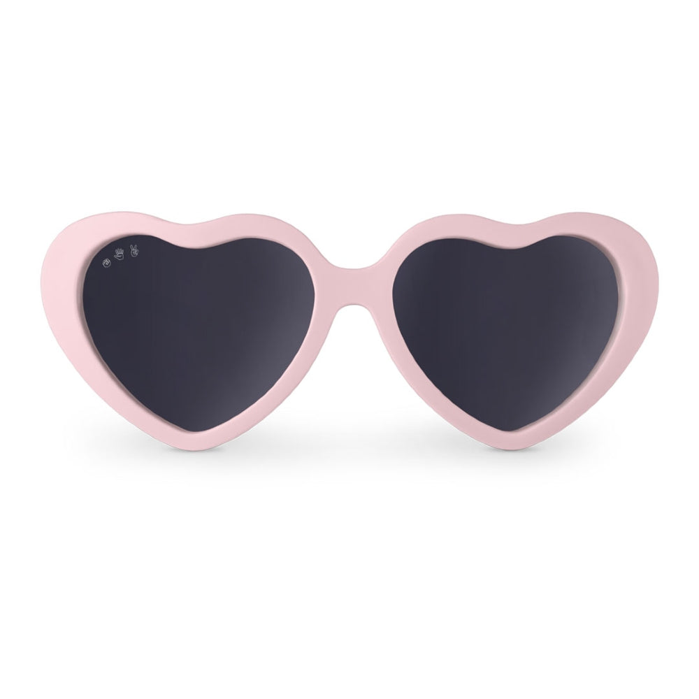 Heart-shaped sunglasses with a light pink frame and dark gray lenses, shown against a plain white background.