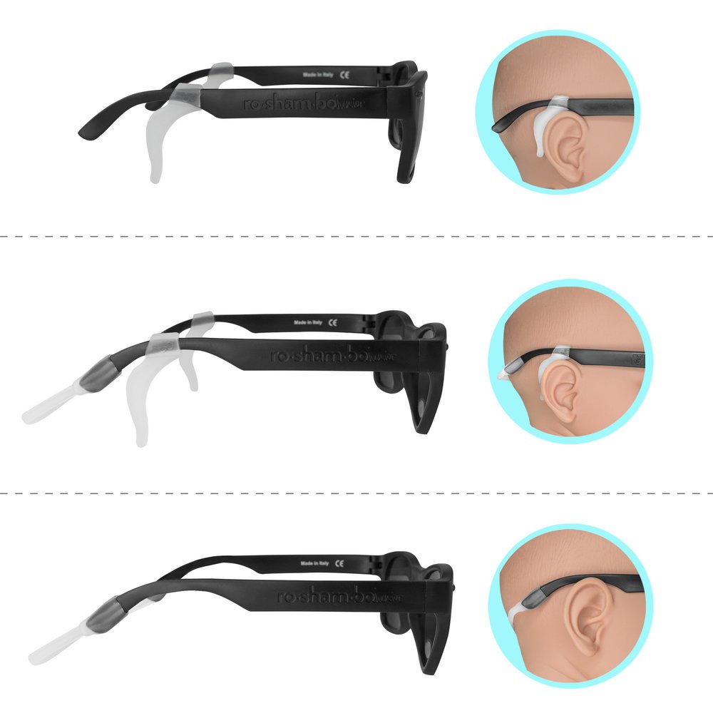 Black eyeglasses with a close-up inset showing them worn on a mannequin head with clear silicone attachments 