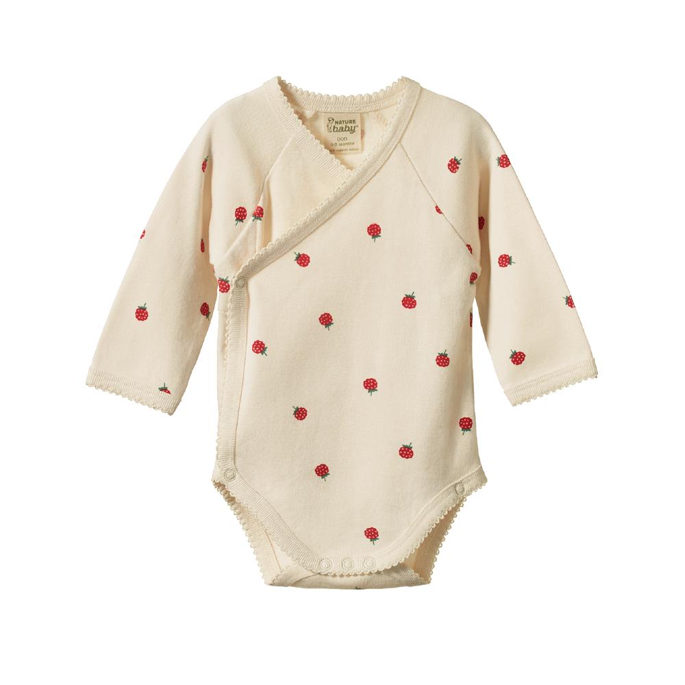 Cream baby bodysuit with red raspberry patterns on a white background