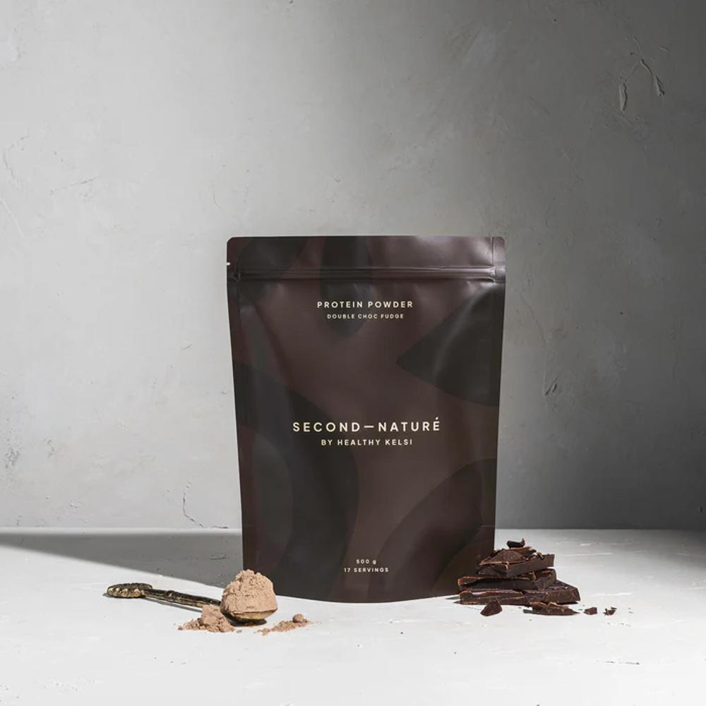 Brown Second Nature protein powder pouch against grey background.