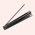 Set of tent poles on a light pink background