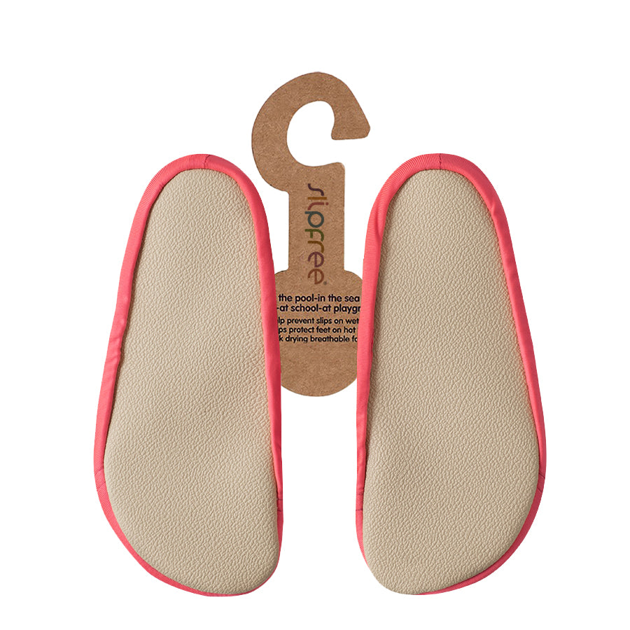 Beige shoe insoles with pink edges on a white background