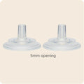 Two clear silicone spouts with a 5mm opening on a beige background