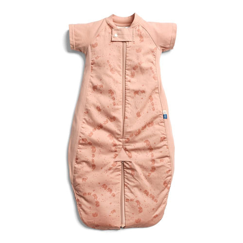 Pink baby sleeping bag with subtle pattern on a white background
