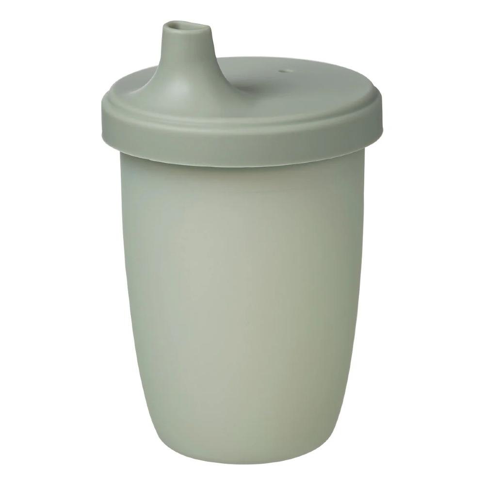 Green sippy cup with a lid on a white background