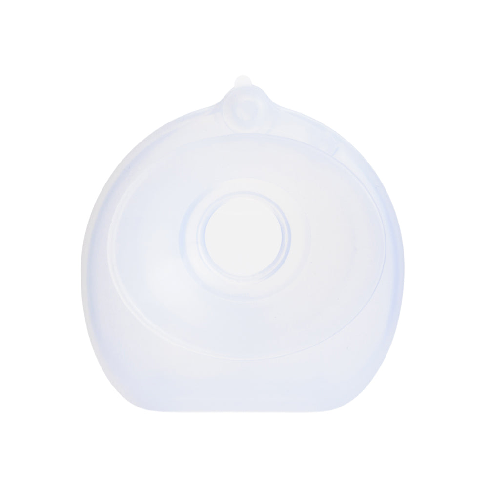 Silicone milk collector on a white background
