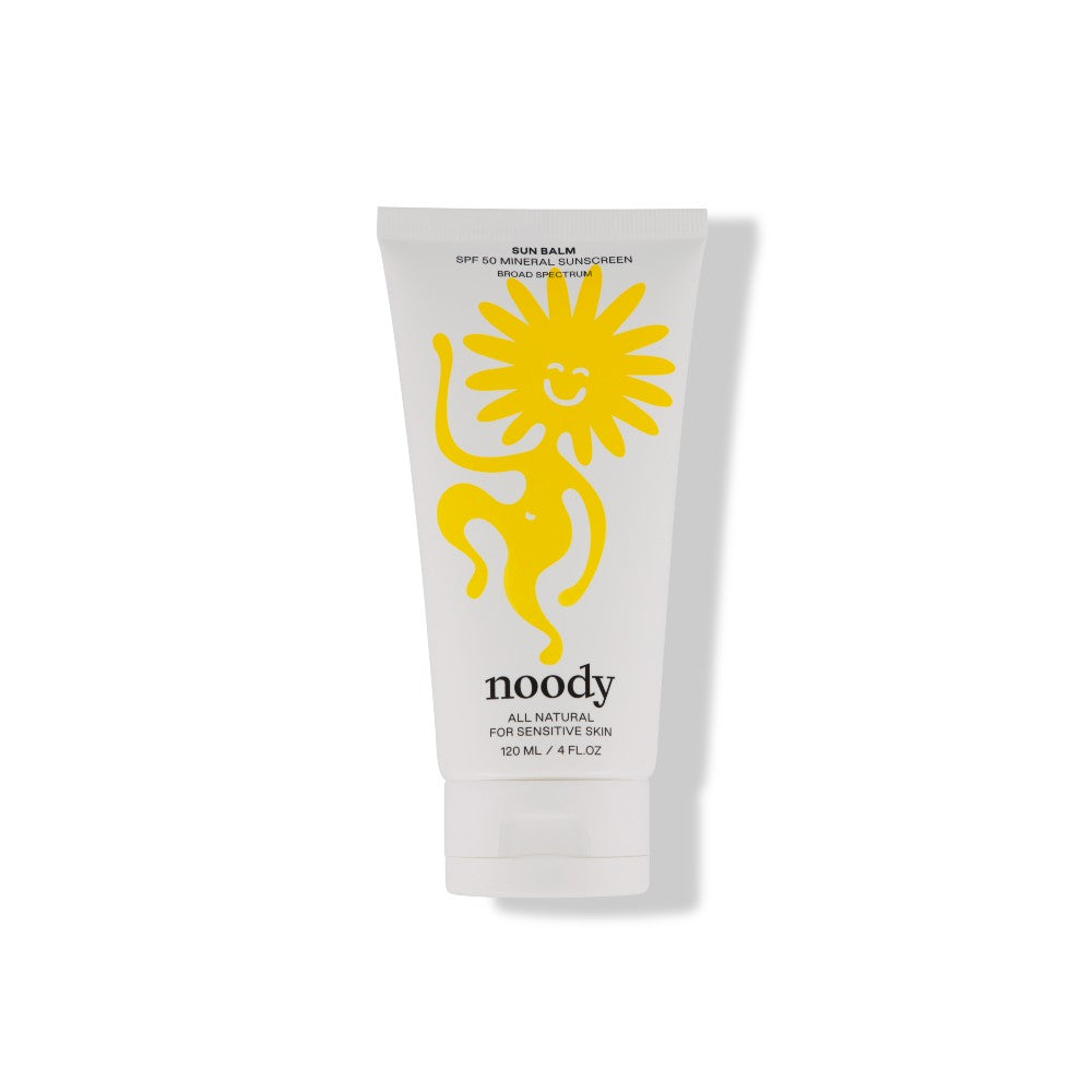 White Noody sunscreen bottle against white background.