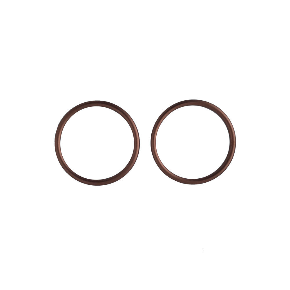 Two Bronze sling rings on a white background