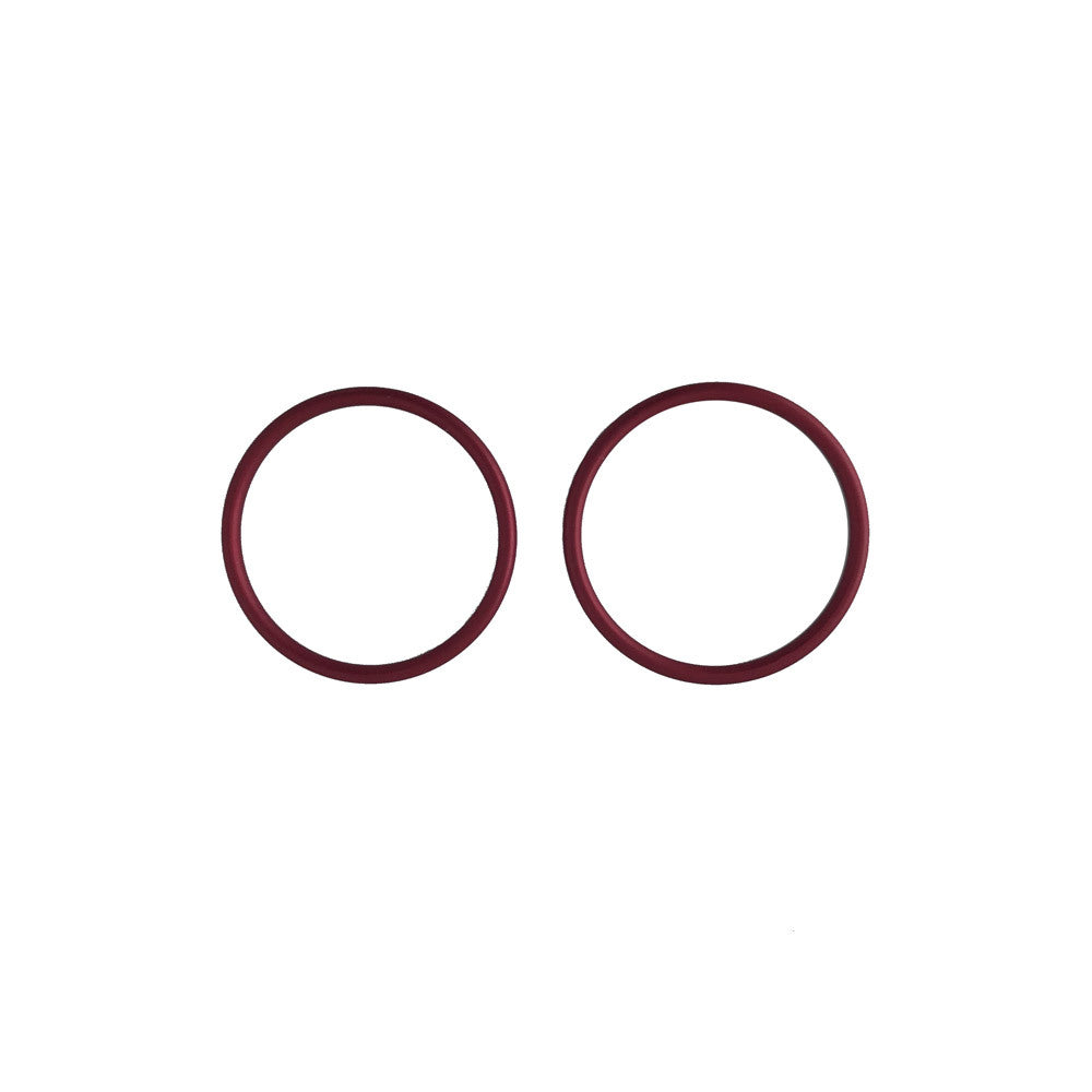 Two Red sling rings on a white background
