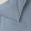 Cotton duvet cover in a solid blue colour. 