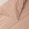 Cotton duvet cover in a solid blush pink colour. 