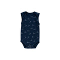 Organic cotton singletsuit on a white background. Navy blue base with an all over sailboat print. 