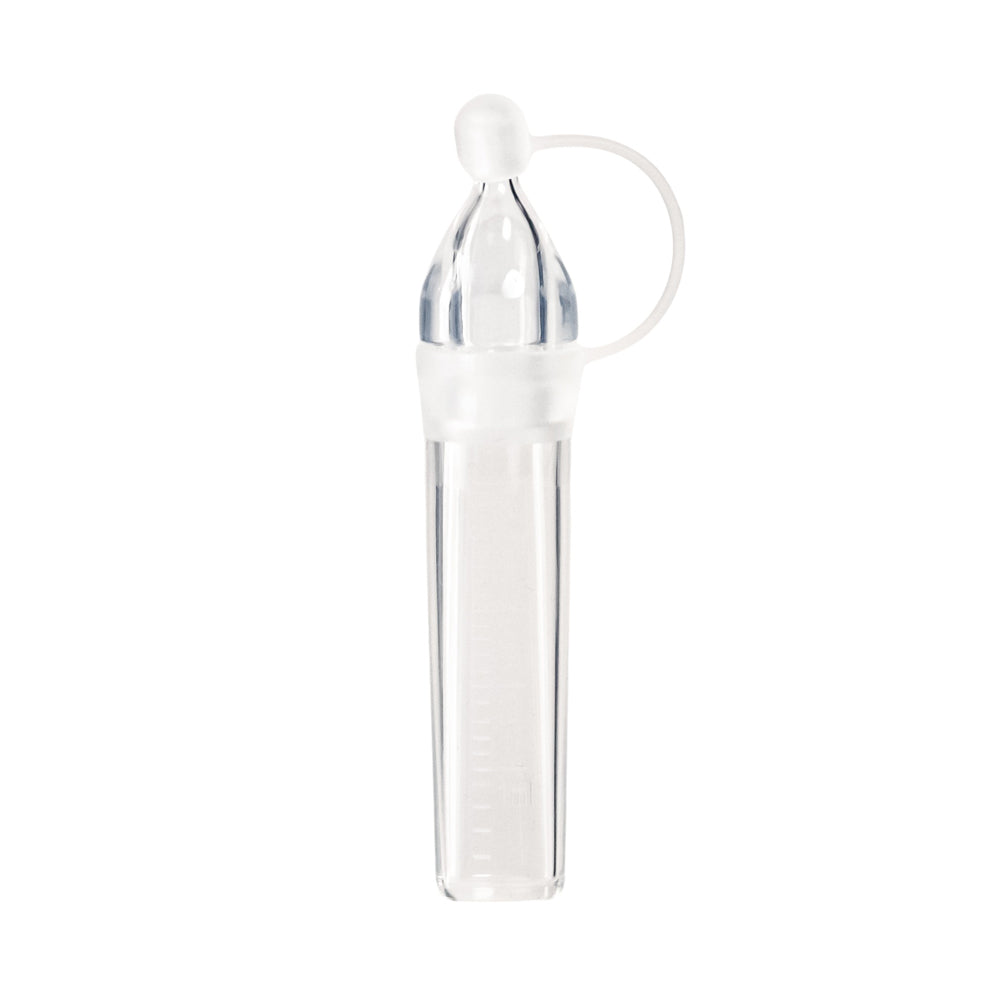 Clear silicone colostrum collector on a white background