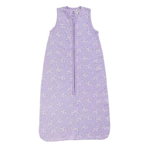 A sleeveless cotton baby sleep sack with a floral print on a lilac background, shown flat against a white background.