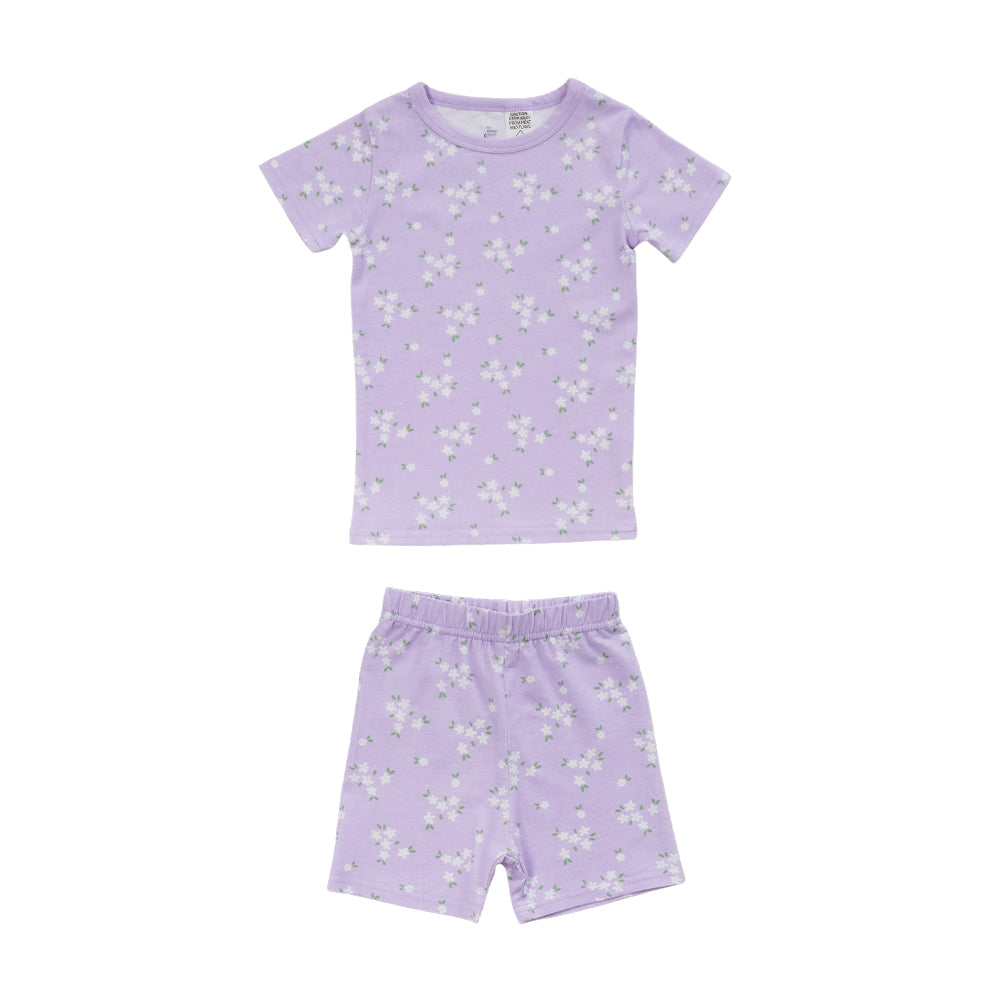 Cotton summer Pjs on a lilac base with an all over floral print on a white background. 
