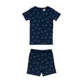 Cotton summer Pjs on a navy base with an all over sailboat print on a white background. 