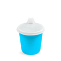 Blue sippy cup with a white lid on a white background