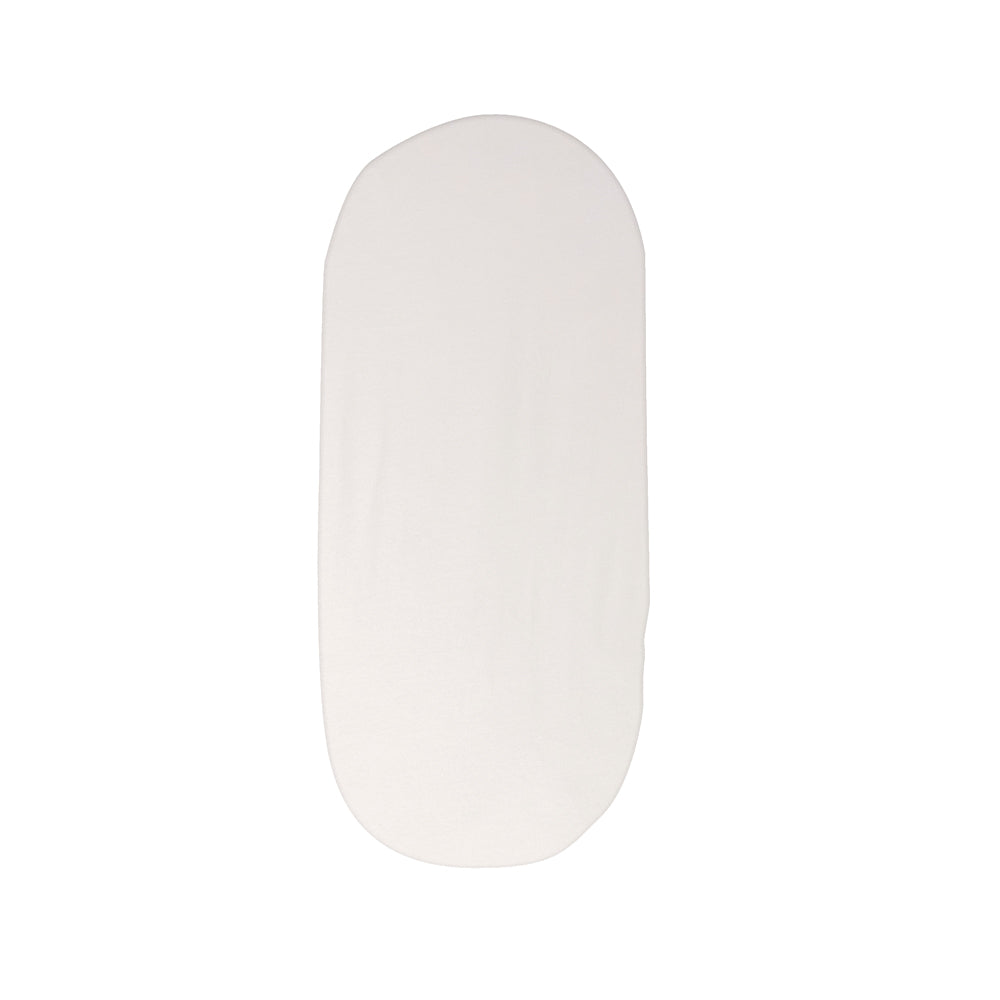 Moses basket with white cover on a white background