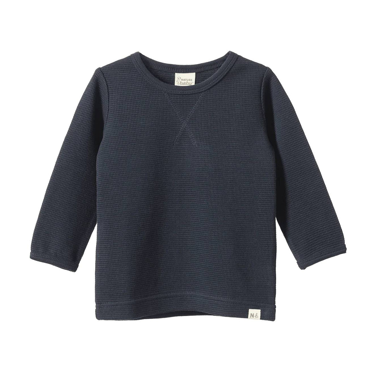 Cotton navy blue waffle textured long-sleeve shirt on a white background
