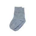 Pair of light blue woolbabe sleepy socks with textured sole on a white background