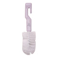 White bottle brush with purple handle and sleep store branding on a white background